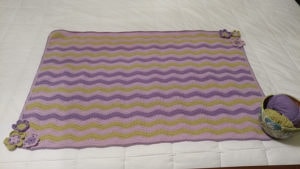 baby blanket in shades of purple and green