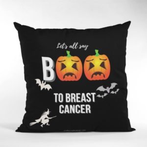 Standing pillow featuring pumpkins, bats, and a witch, with the words: Let's all say BOO to breast cancer.